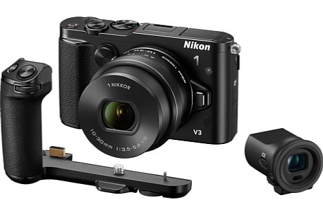 Bild Die Nikon 1 V3 mit 10-30 mm Motorzoom-Objektiv, Aufstecksucher DF-N1000 und Zusatzgriff GR-N1010. [Foto: Nikon]