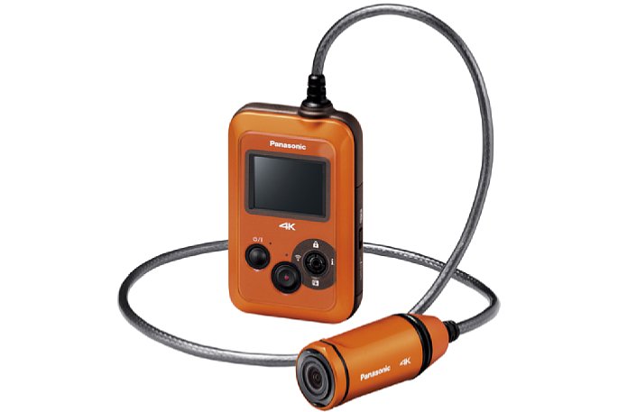 Bild Die Panasonic HX-A500 ist eine "Wearable Camera" (tragbare Kamera). Die Objektiveinheit ist zwar klein, aber fest mit einem dicken Kabel mit der großen Aufnahmeeinheit verbunden. Das schränkt die Einsatzmöglichkeiten leider erheblich ein. [Foto: Panasonic]