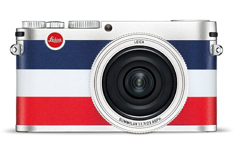 Bild Die silberne Leica X „Edition Moncler“ ist mit einer Tricolore-Belderung in Blau-Weiß-Rot versehen. [Foto: Leica]